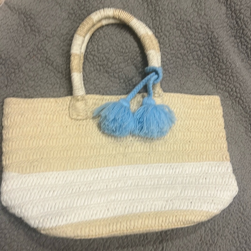 Casual striped bag with poms